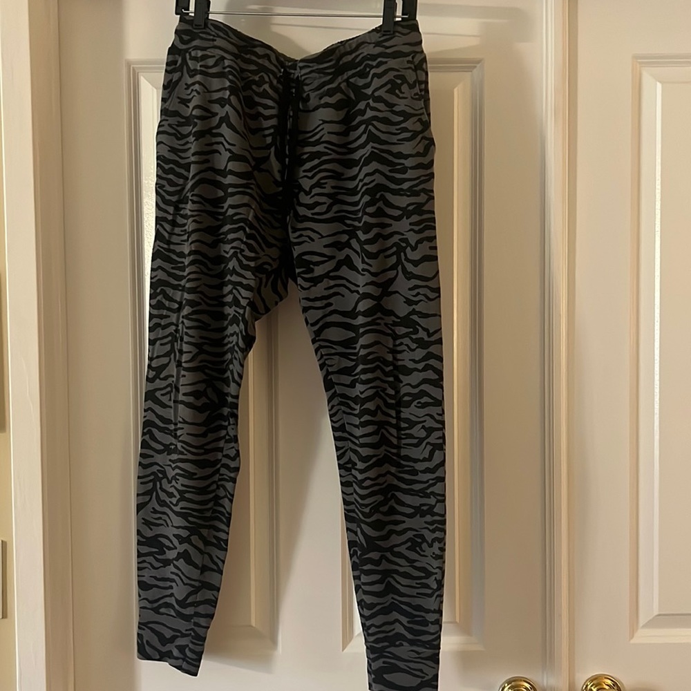 Mono B Brand gray and black tiger striped joggers.